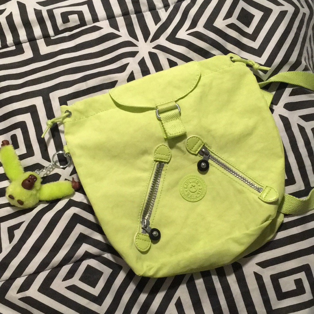Neon green Kipling mini backpack